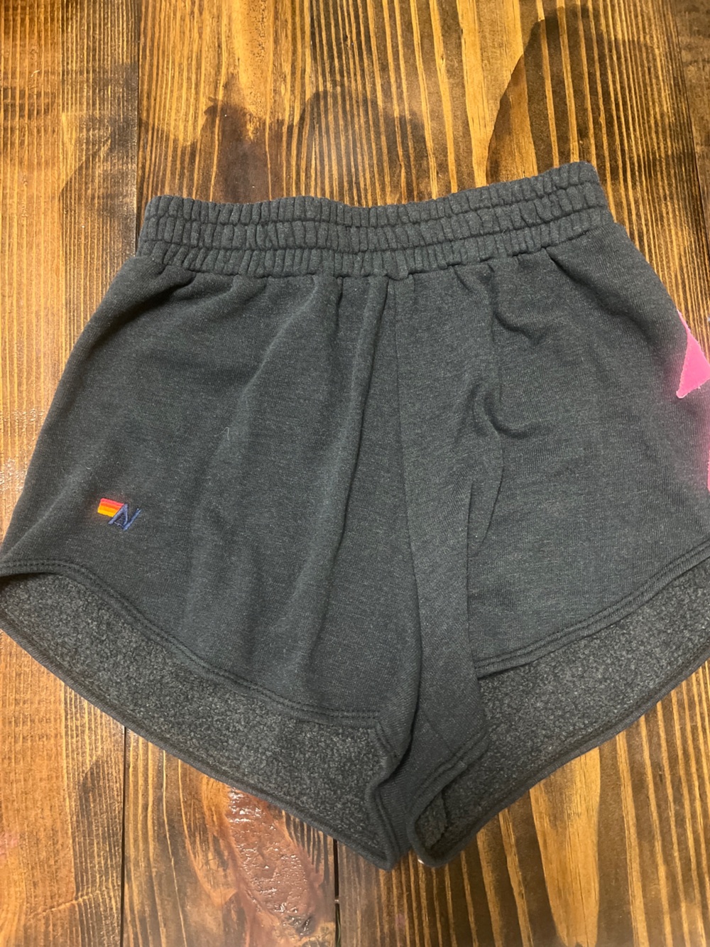 Aviator Nation Black Fleece-Lined Shorts. Hot pink lightning bolt on side. Small